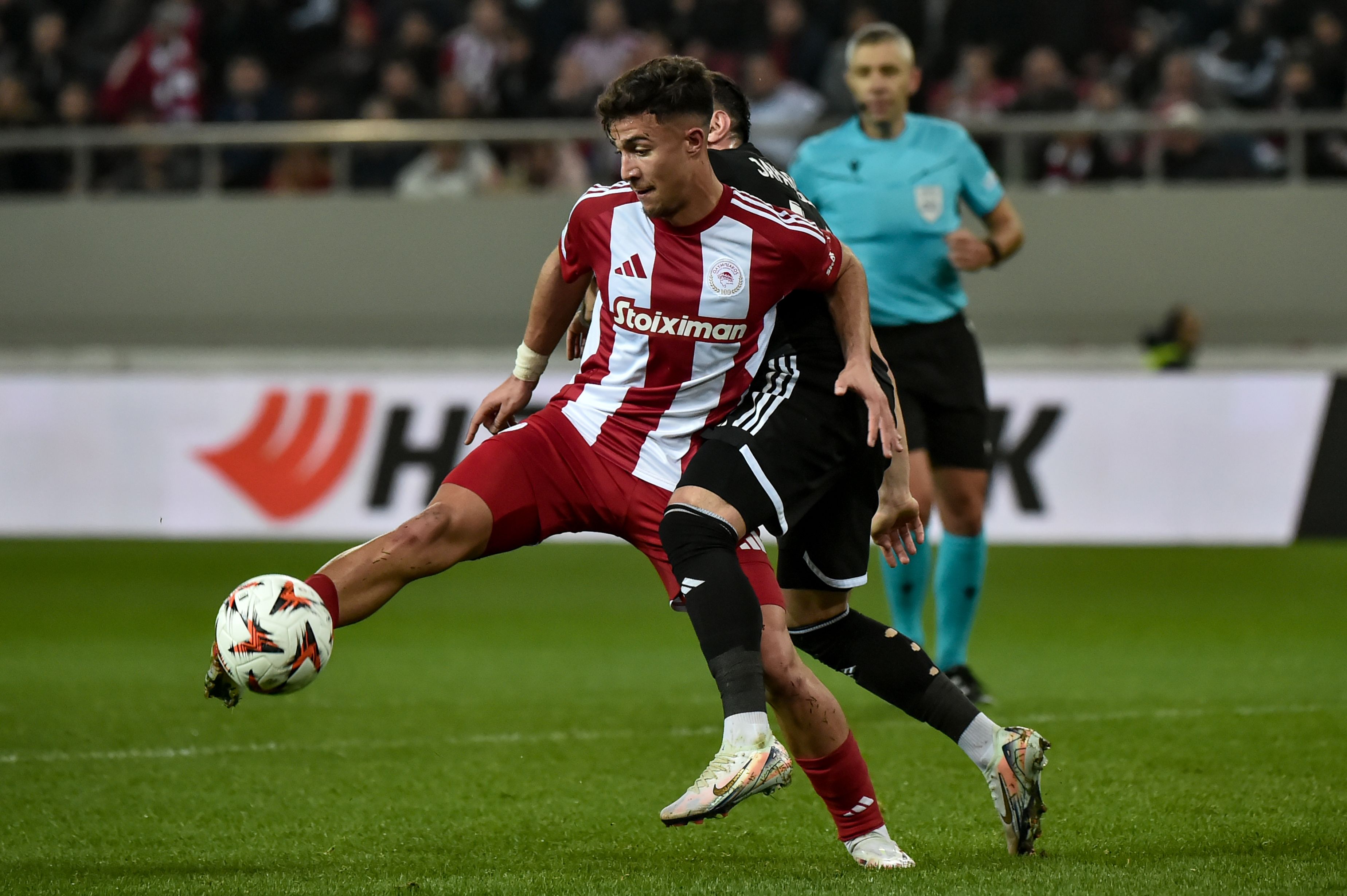 Charalampos Kostoulas in action for Olympiacos.