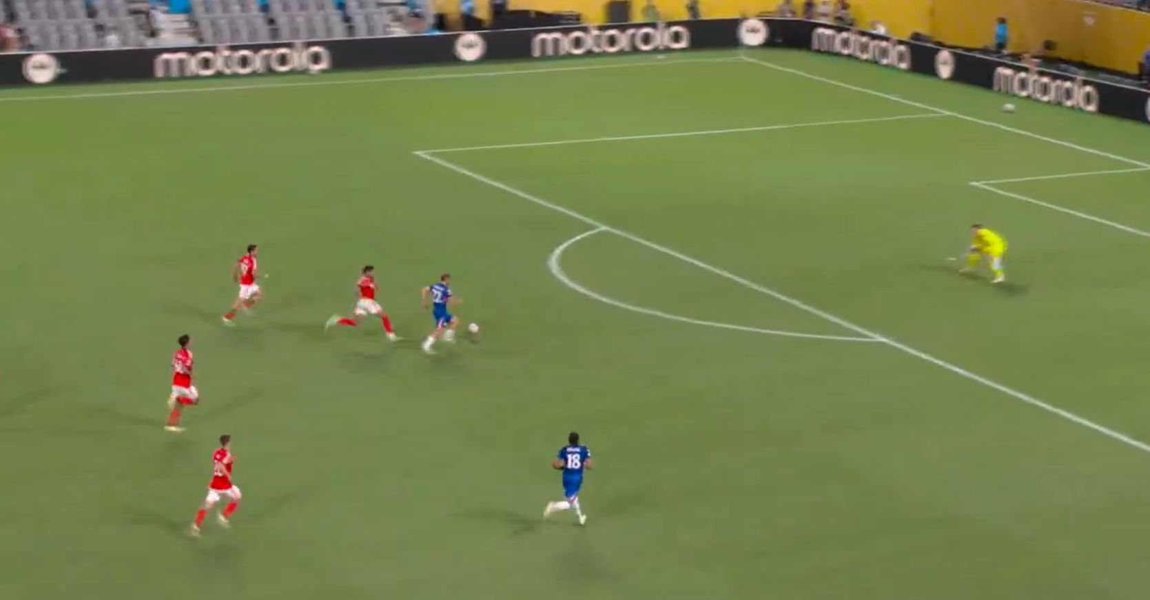 Kiernan Dewsbury-Hall clips a goal in over the Benfica goalkeeper.