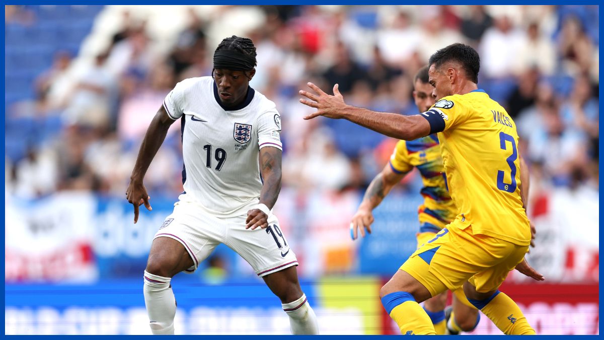 Noni Madueke drops a shoulder for England.