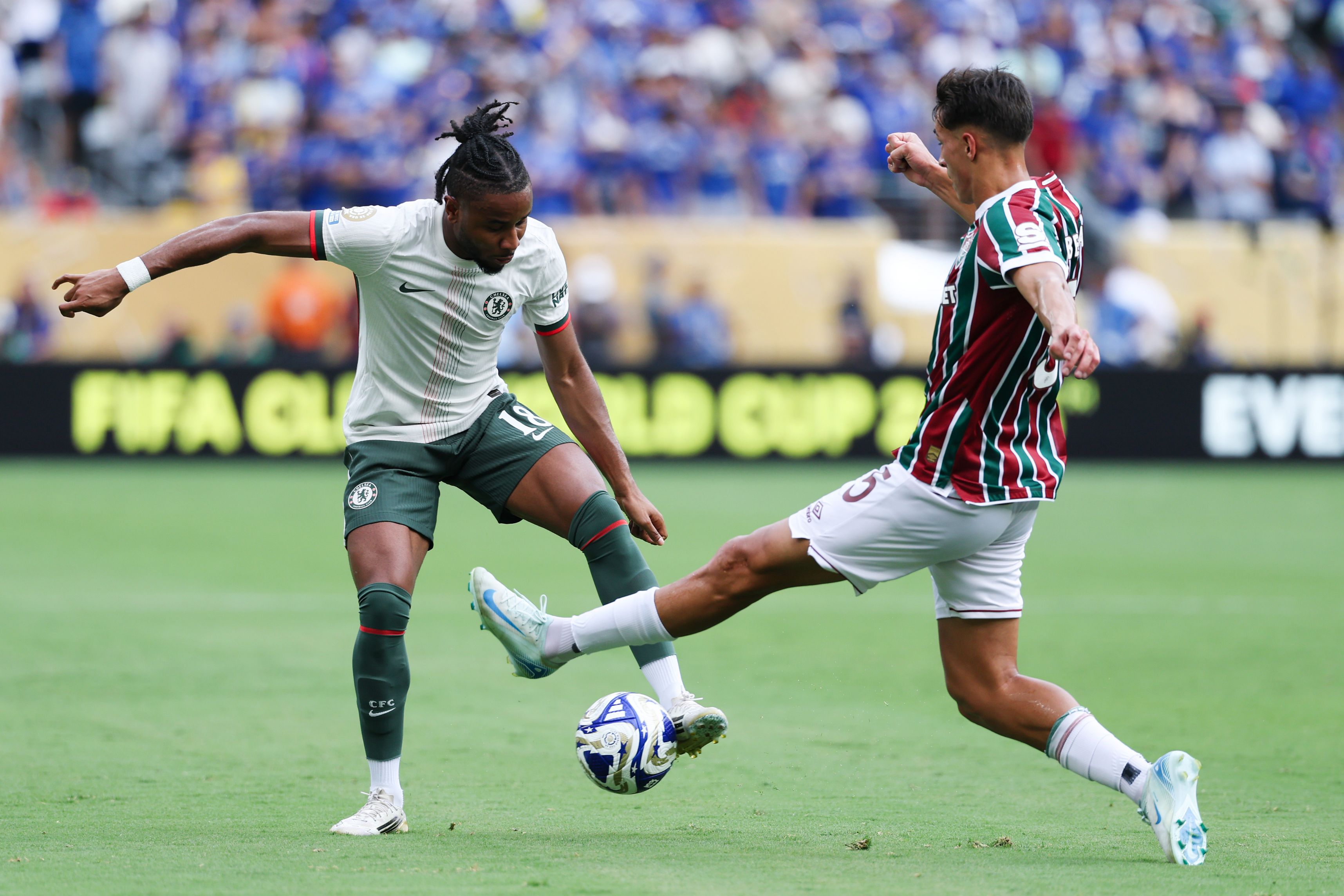 Christopher Nkunku battles for possession against Fluminense.