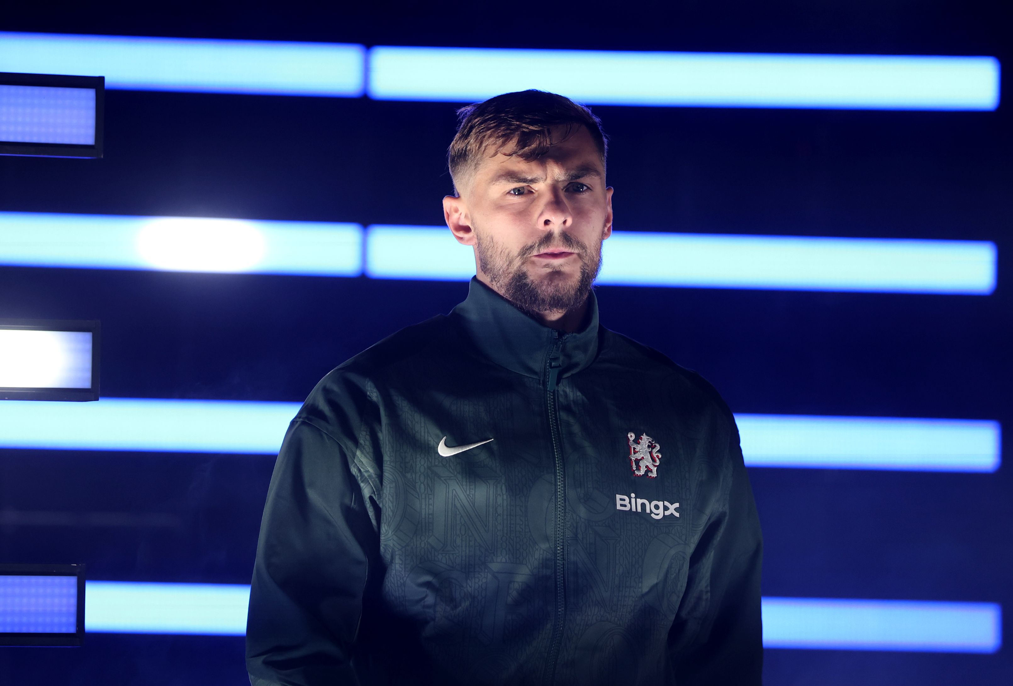 Kiernan Dewsbury-Hall walks onto the pitch for a Chelsea game.