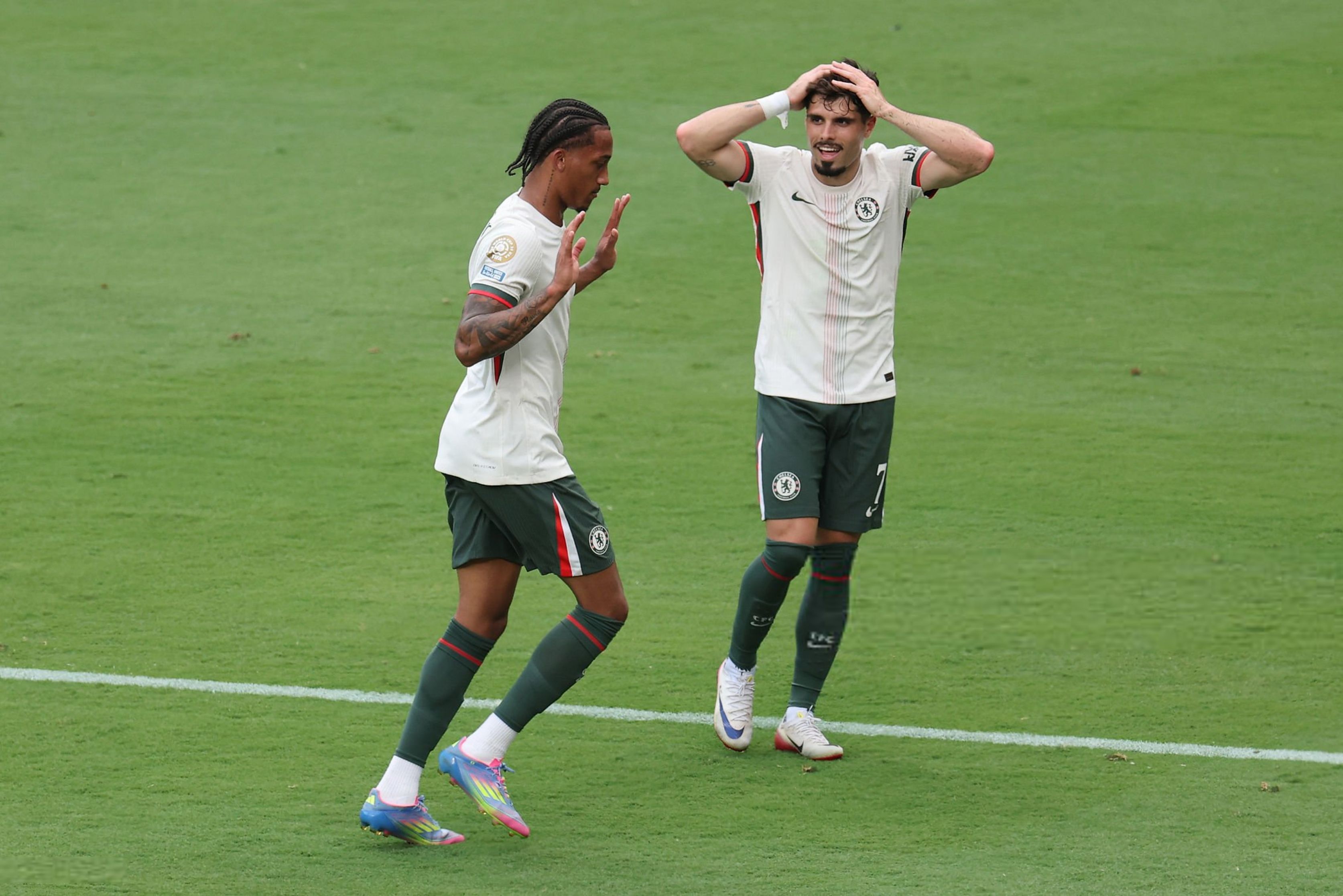 Joao Pedro and Pedro Neto after the former's superb goal.