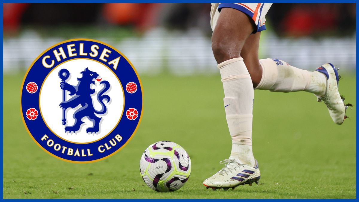 Renato Veiga runs with a Chelsea logo.