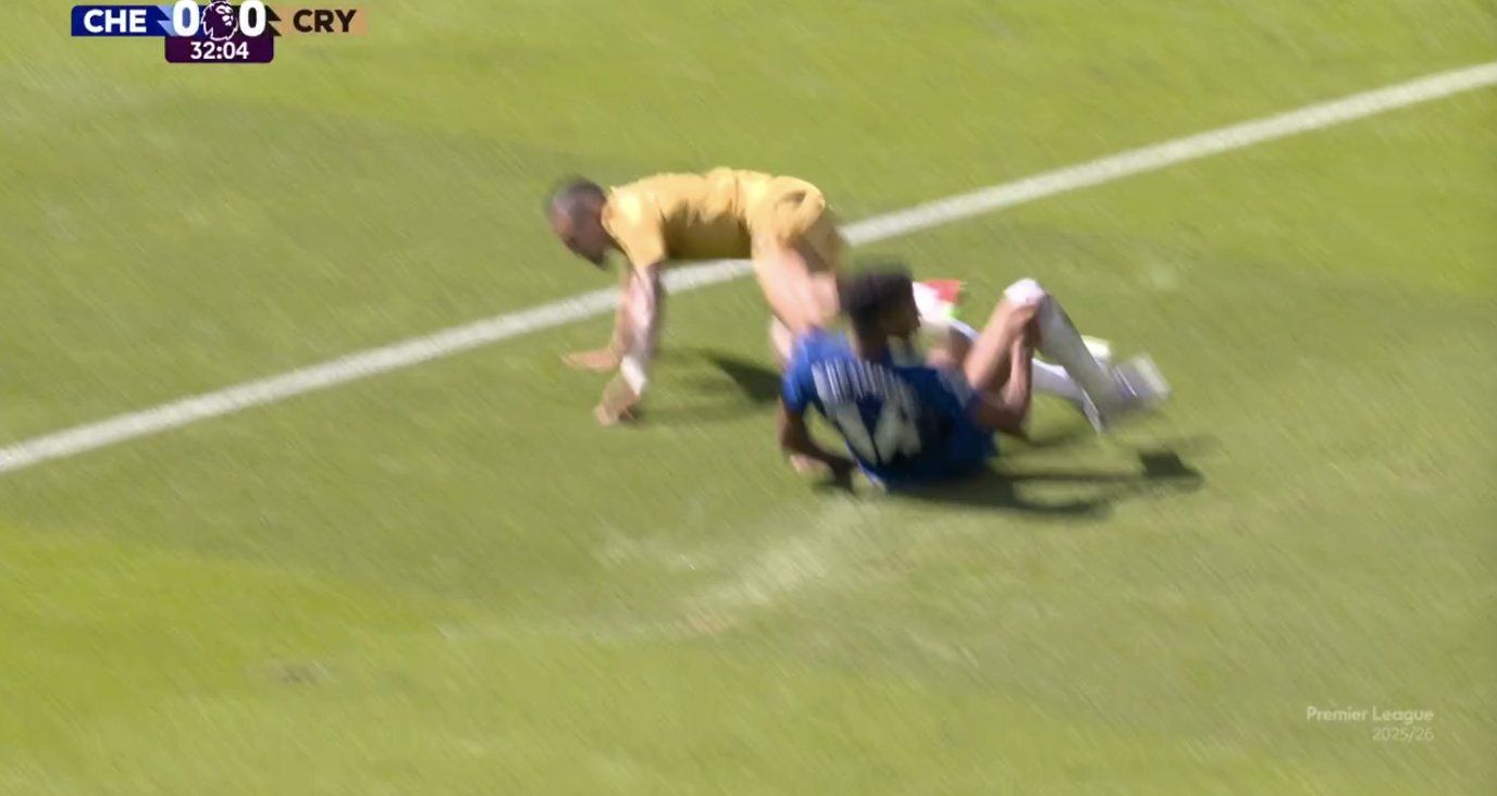 Josh Acheampong makes a tackle on Daniel Munoz.