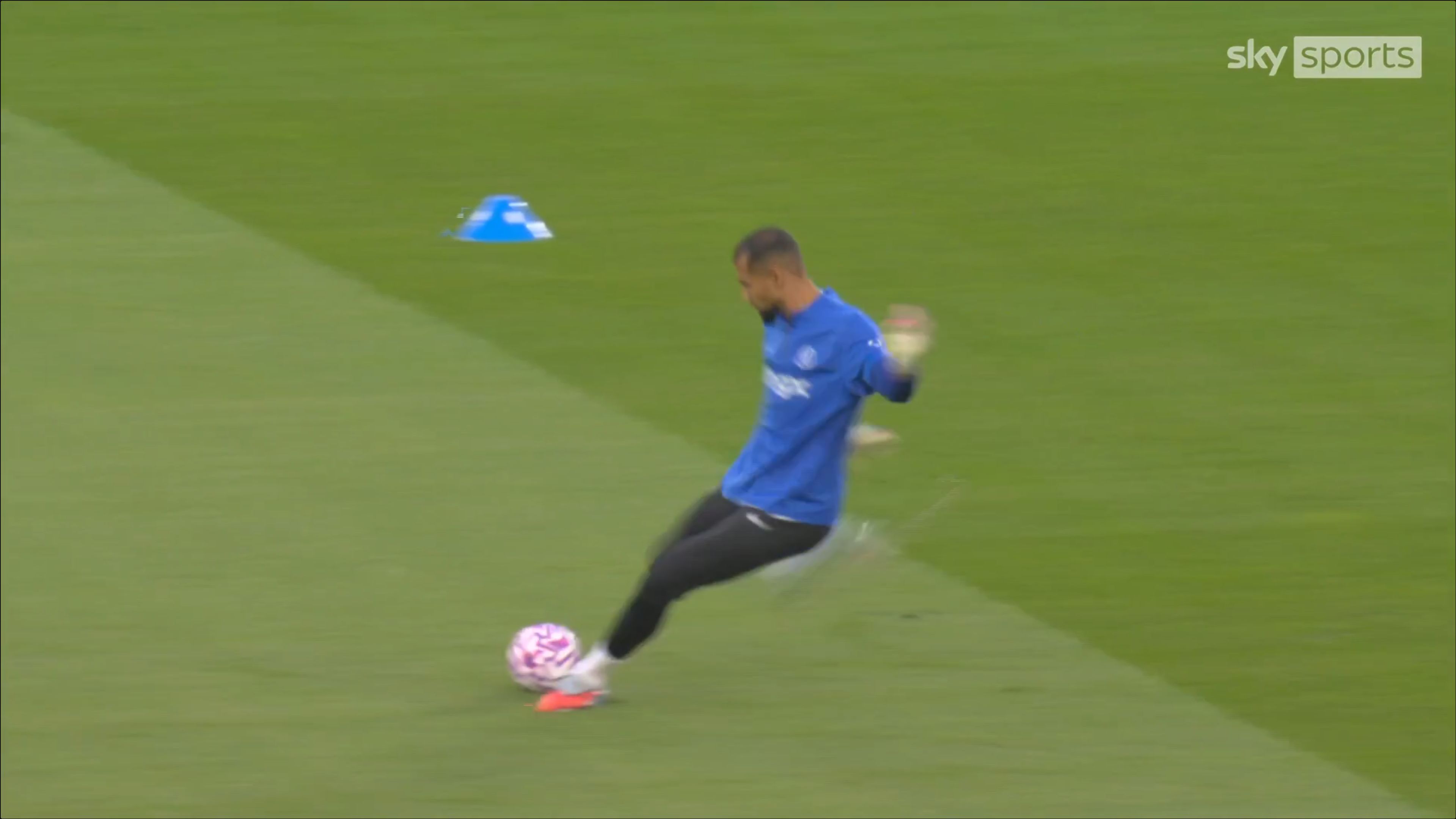 Robert Sanchez kicking long in a warm-up.