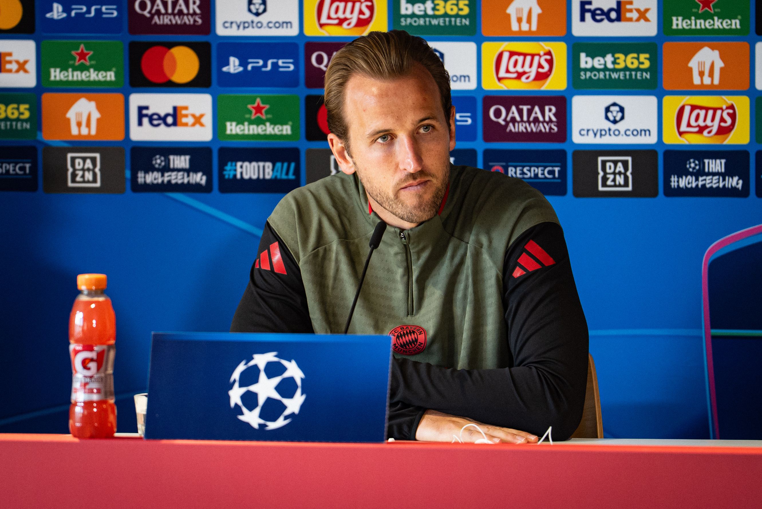 Harry Kane speaks to the media.
