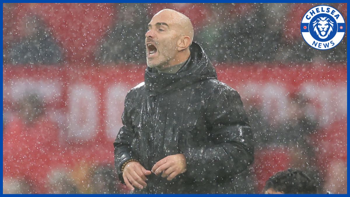 Enzo Maresca in the rain at Old Trafford.