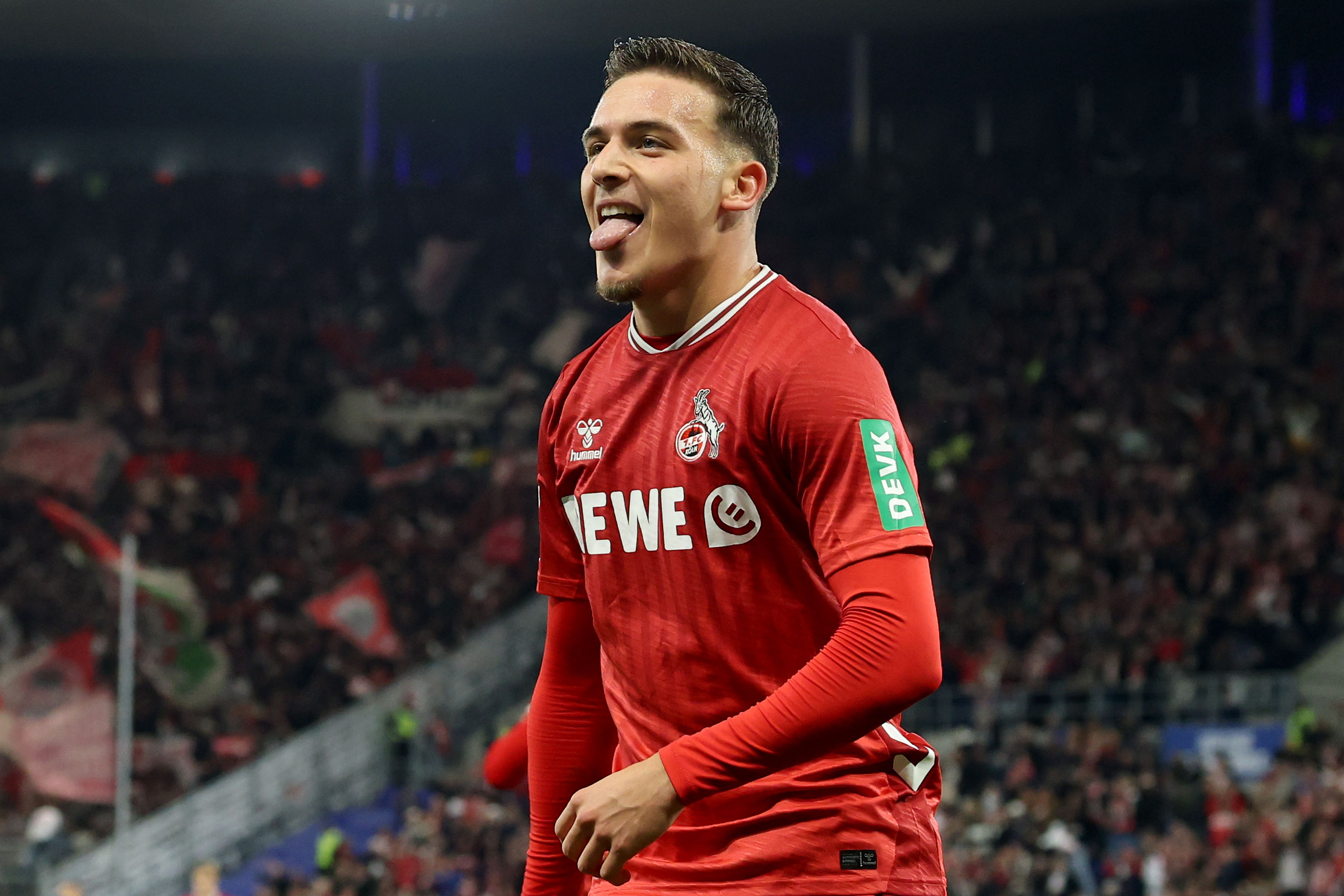 Said El Mala celebrates scoring for Koln.