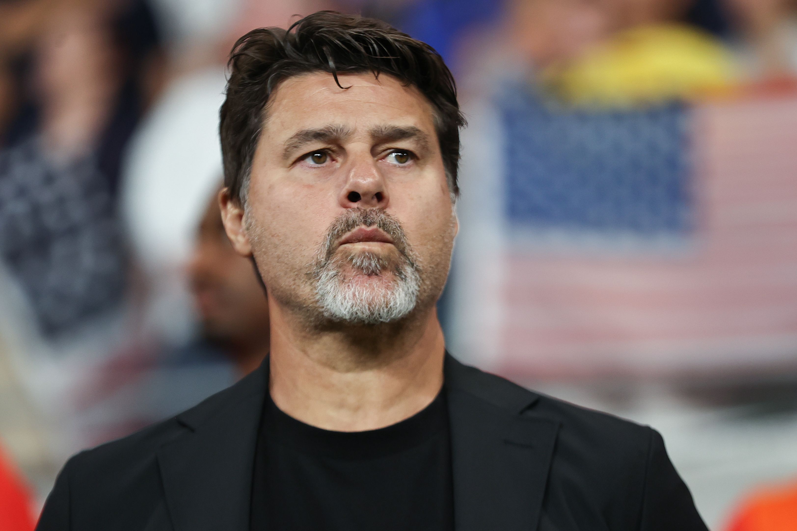 Mauricio Pochettino looks on from the touchline.