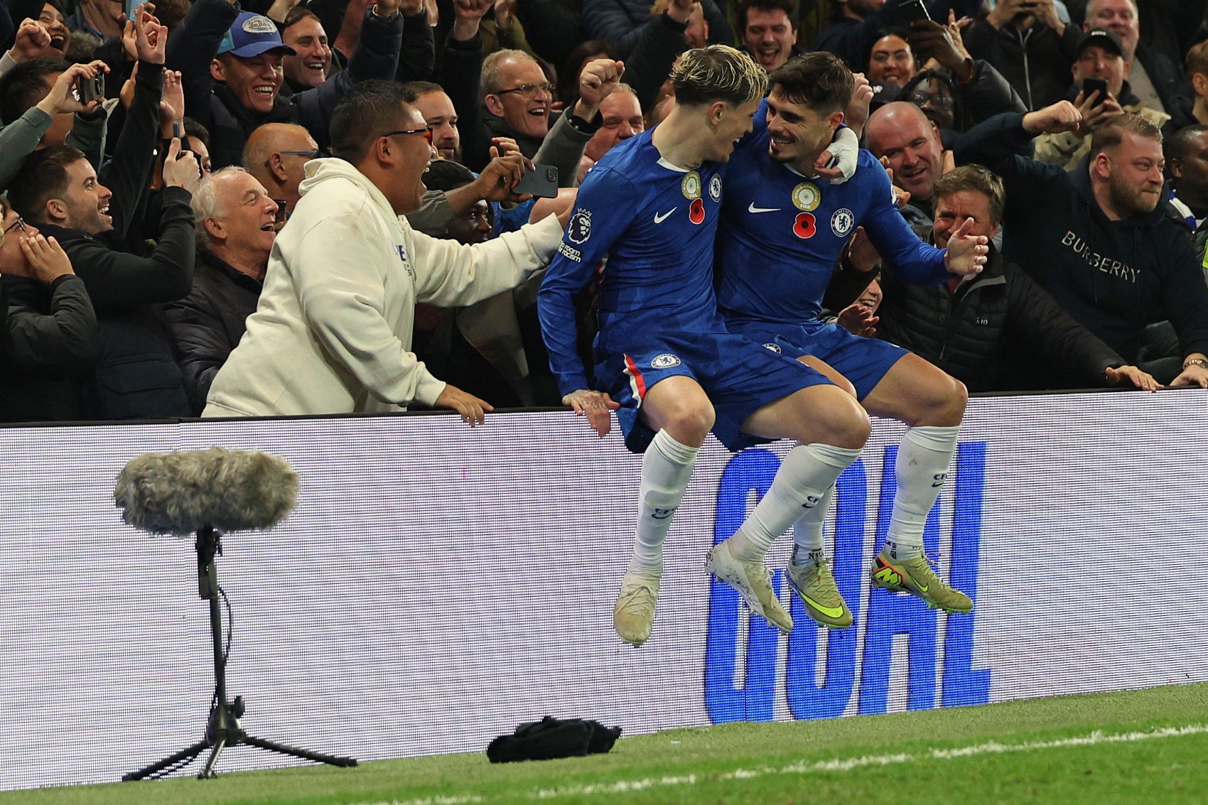 Alejandro Garnacho and Pedro Neto celebrate for Chelsea.