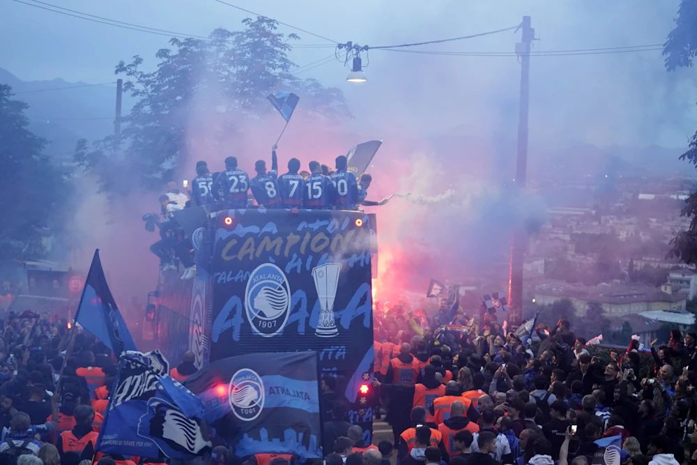 Atalanta celebrate their Europa League trophy.