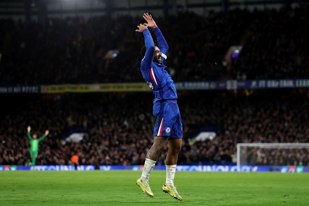 Reece James celebrates his assist.