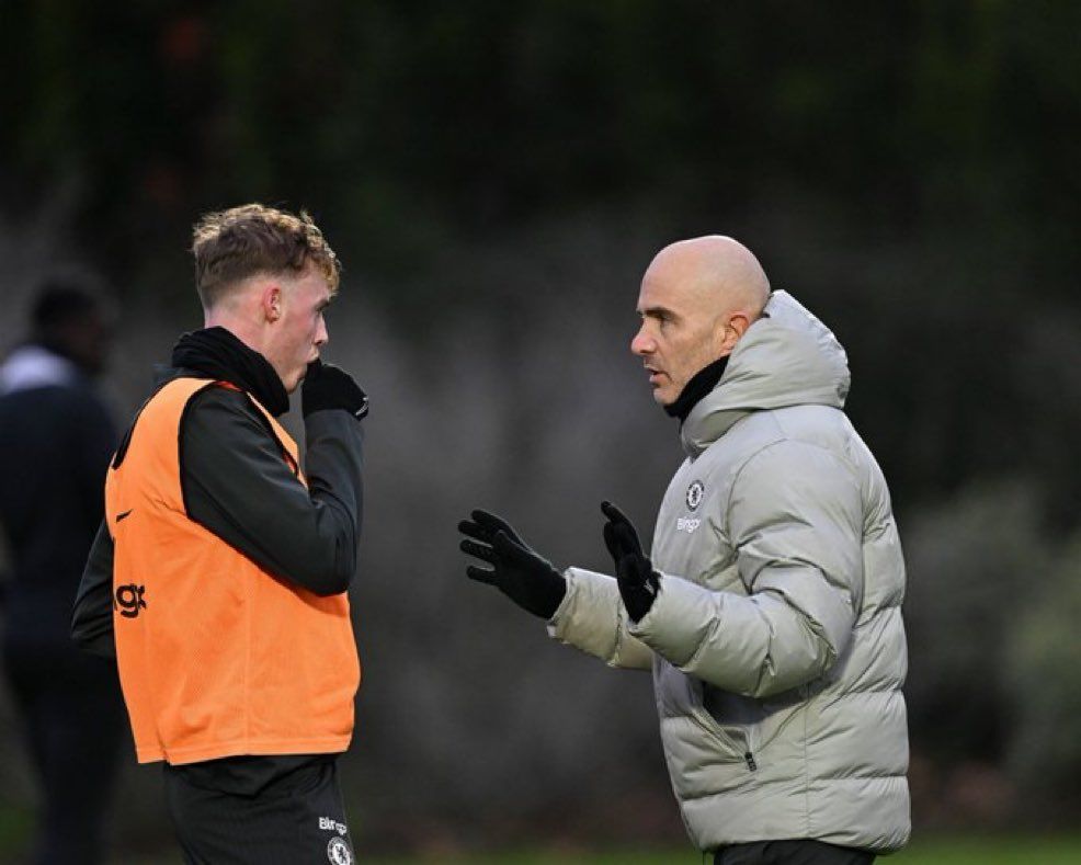 Cole Palmer and Enzo Maresca during a warmup.