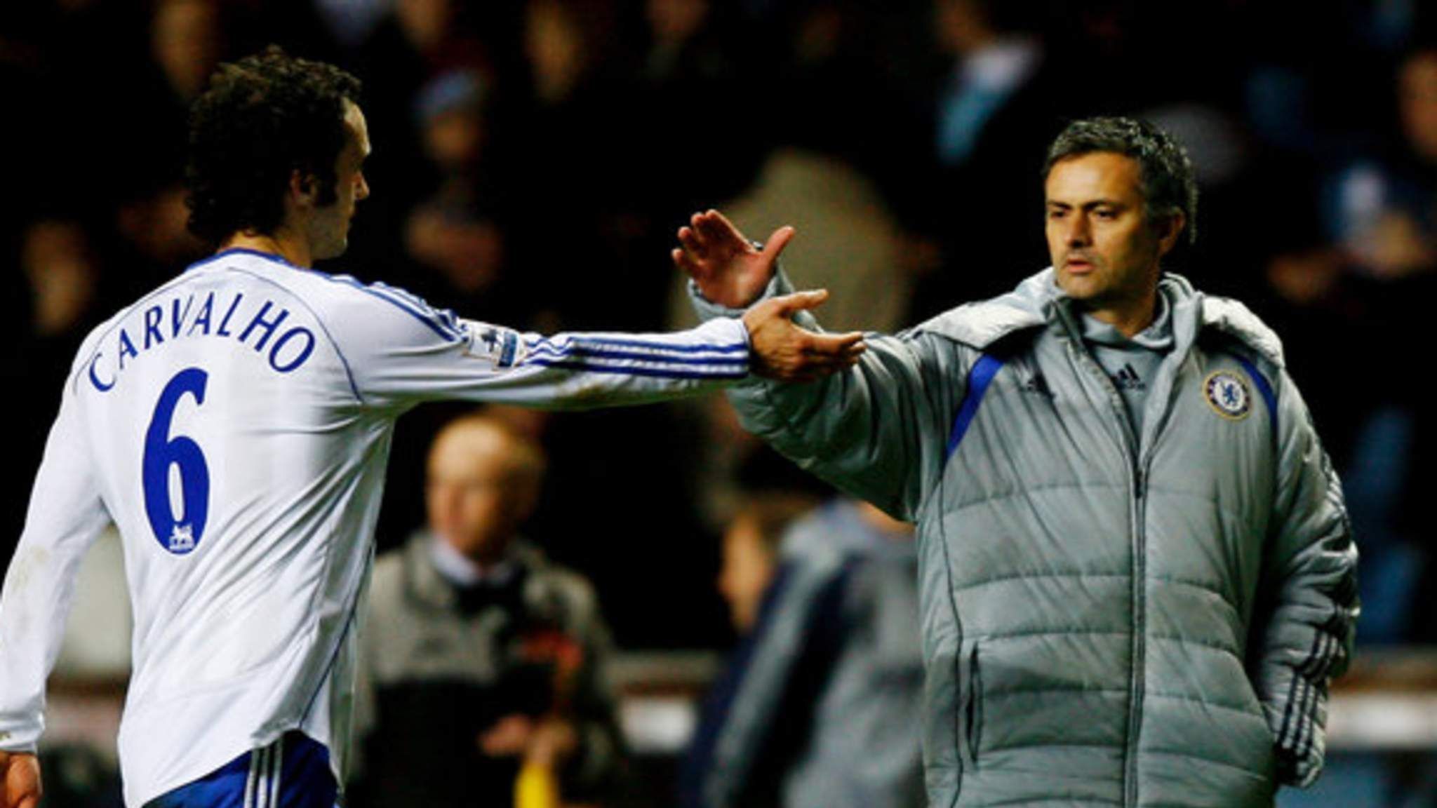 Jose Mourinho with Ricardo Carvalho.