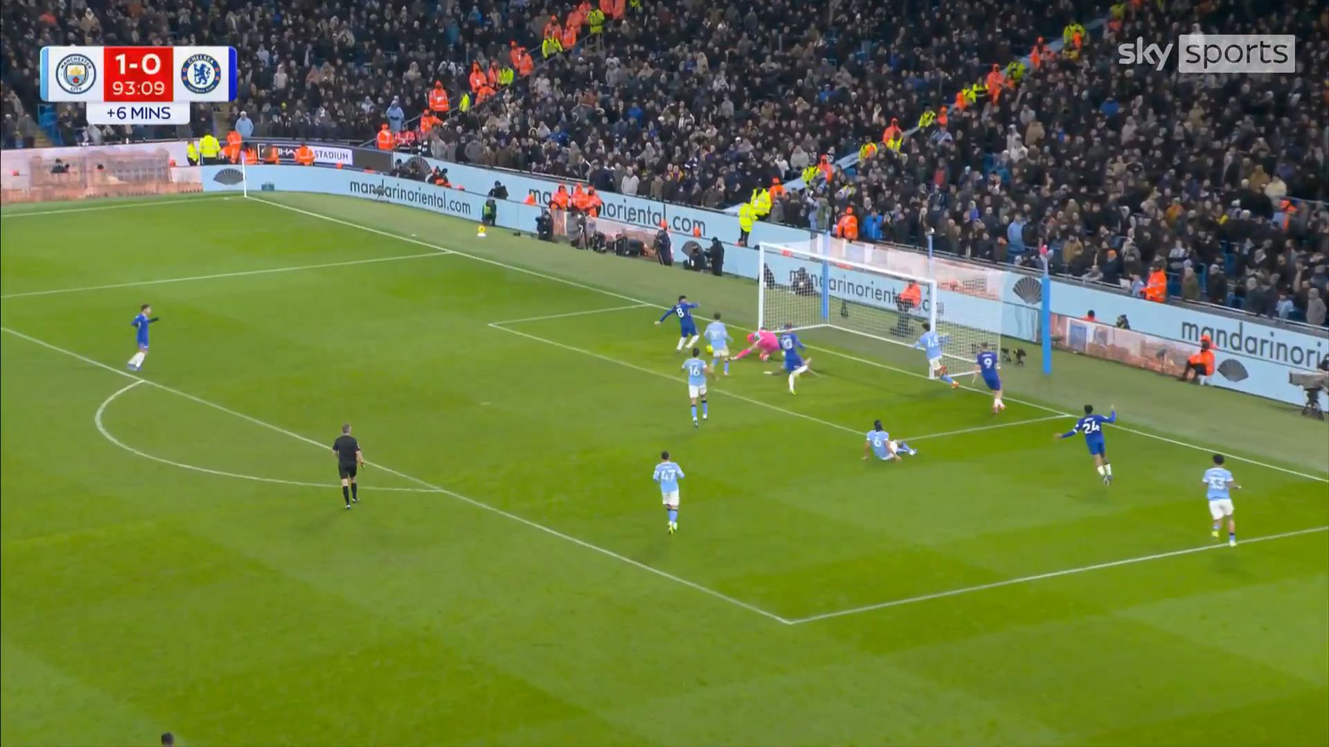 Enzo Fernandez squeezes the ball in against Man City.