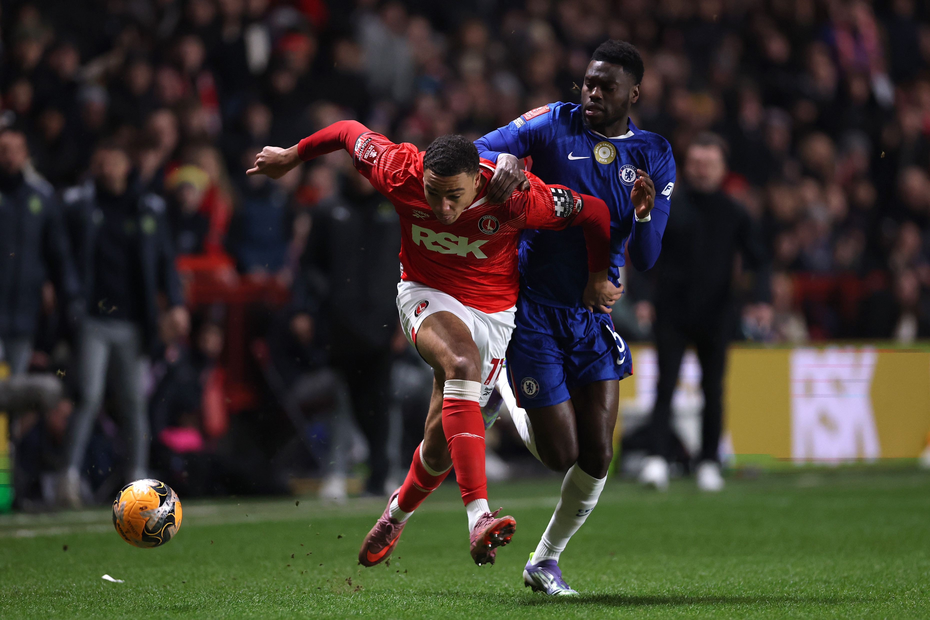Benoit Badiashile battles for possession against Charlton.