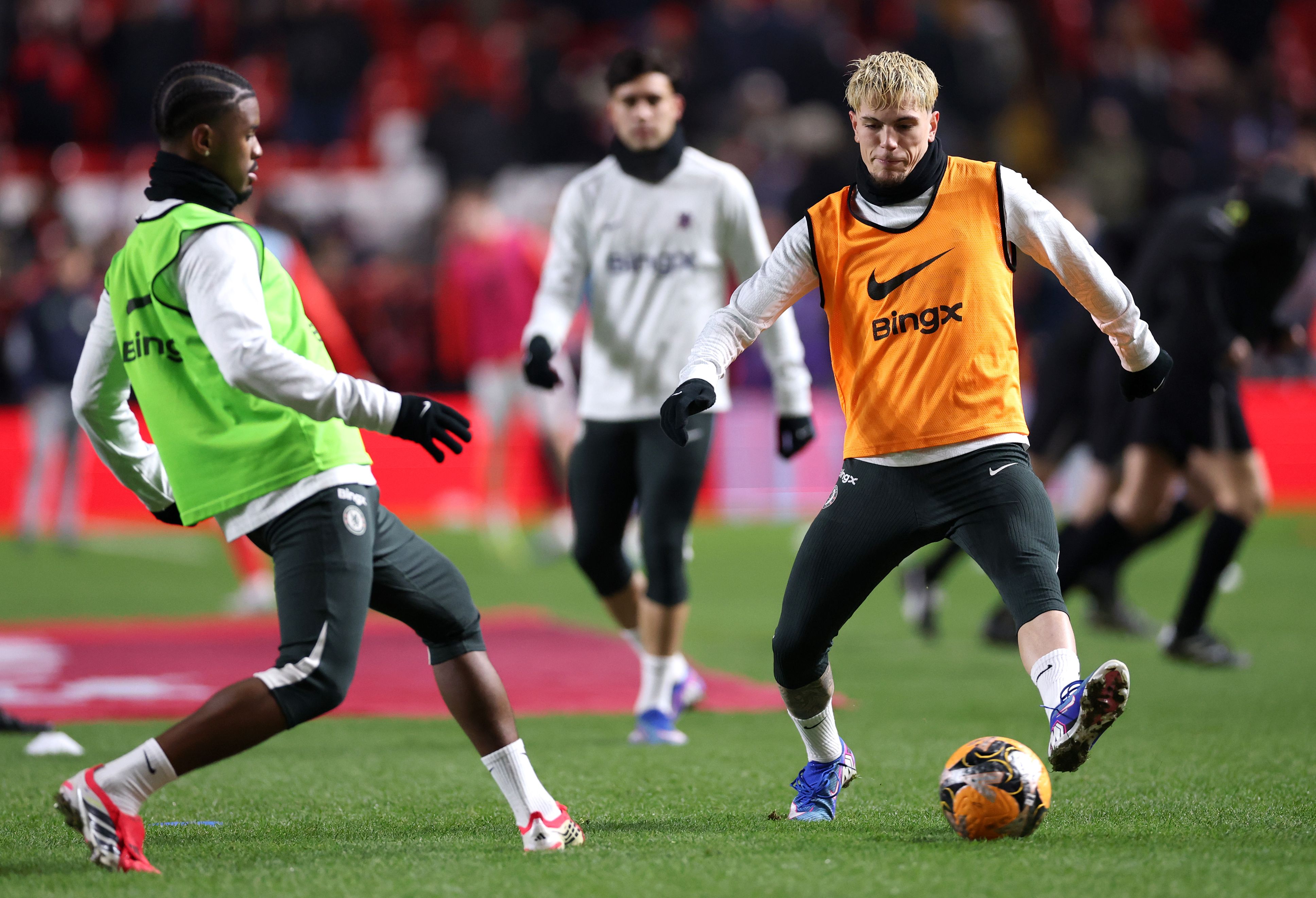 Alejandro Garnacho warms up for Chelsea.