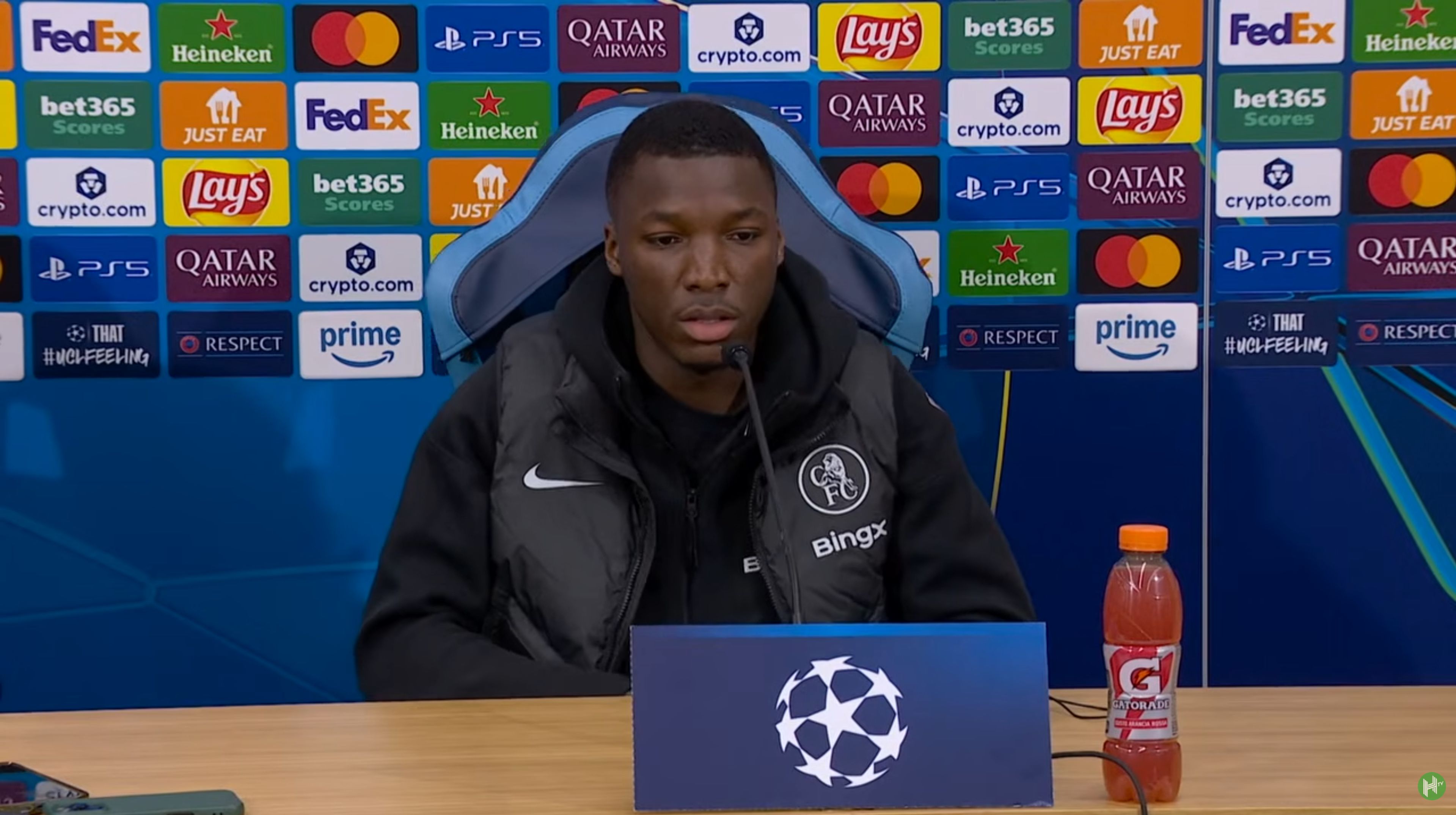 Moises Caicedo speaks to the media.