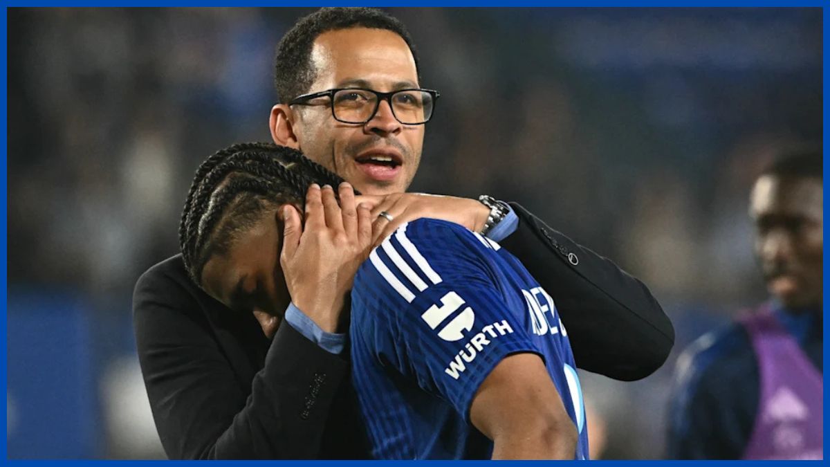 Liam Rosenior with Andrey Santos.