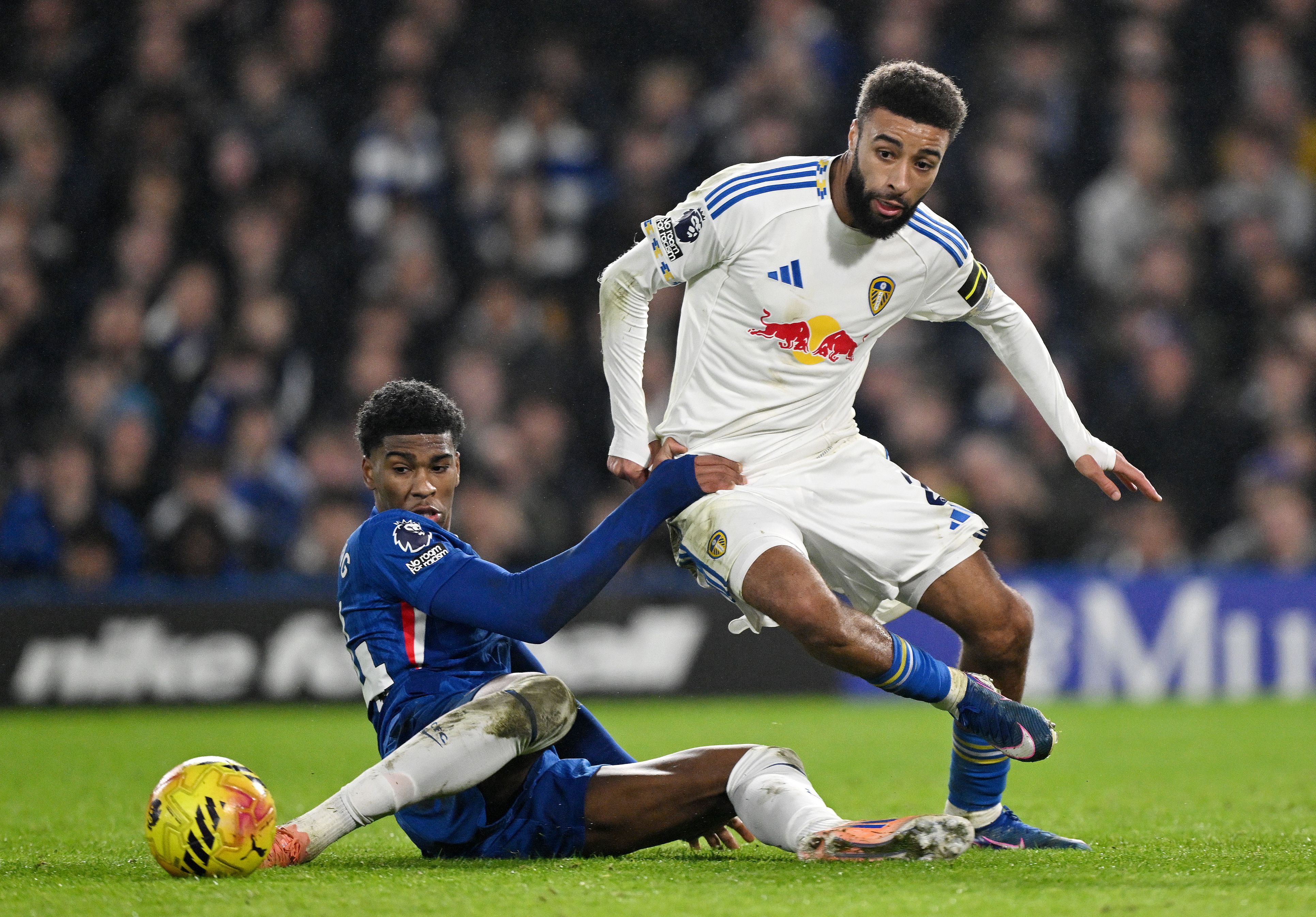 Josh Acheampong battles for possession against Leeds.