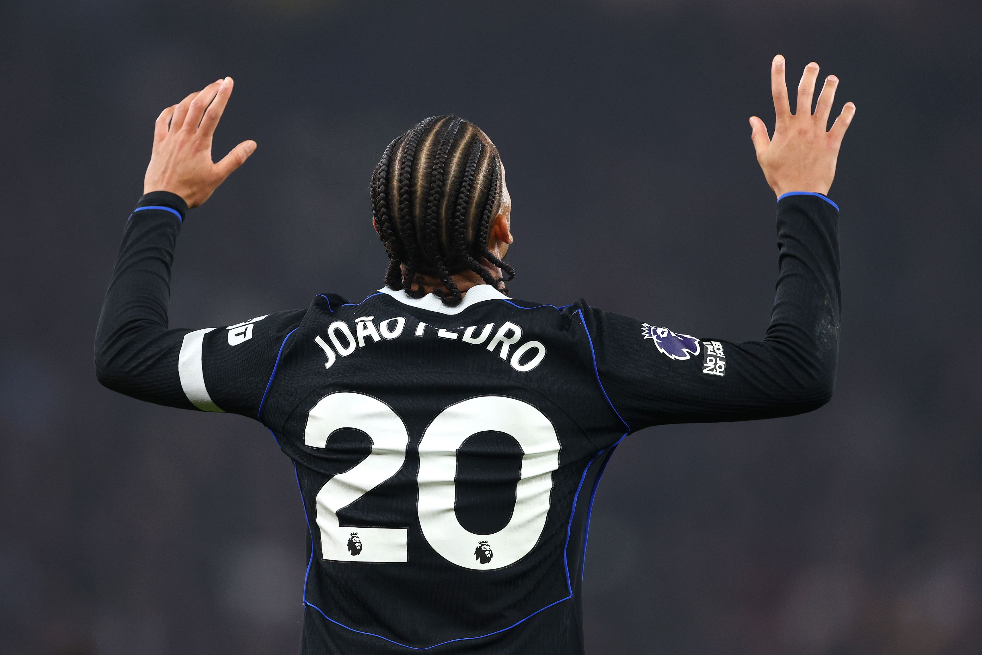 Joao Pedro celebrates scoring against Aston Villa.