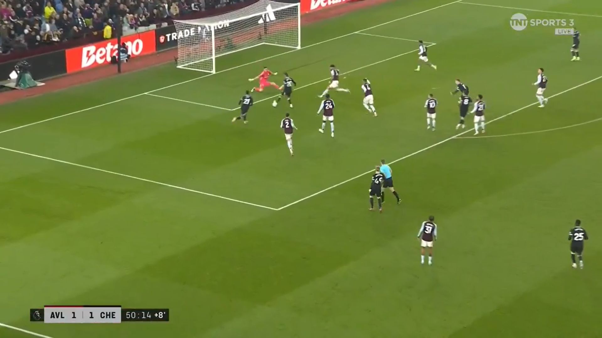 Joao Pedro lifts the ball over Emi Martinez to put Chelsea ahead.