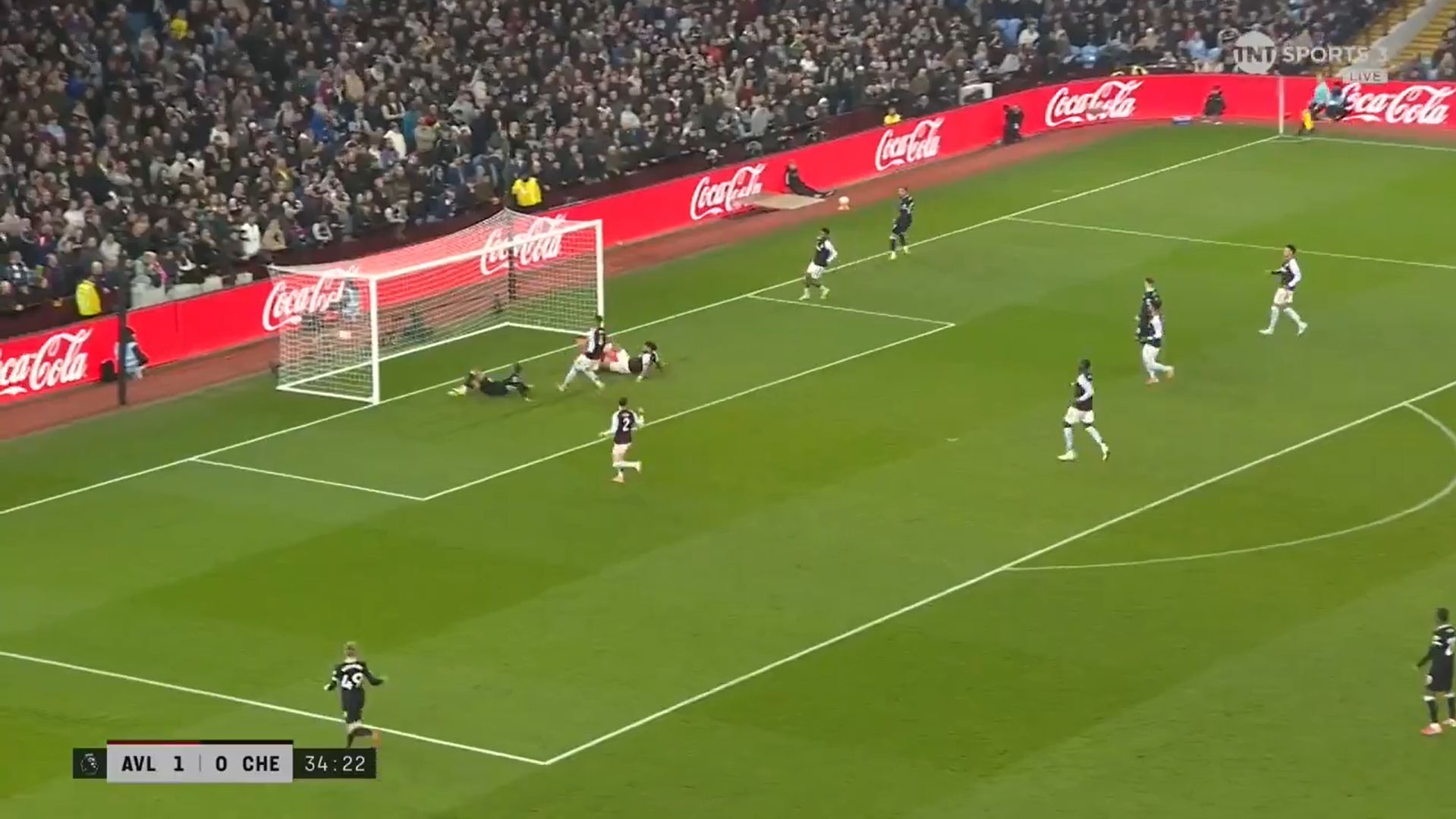 Joao Pedro slides the ball in against Aston Villa.