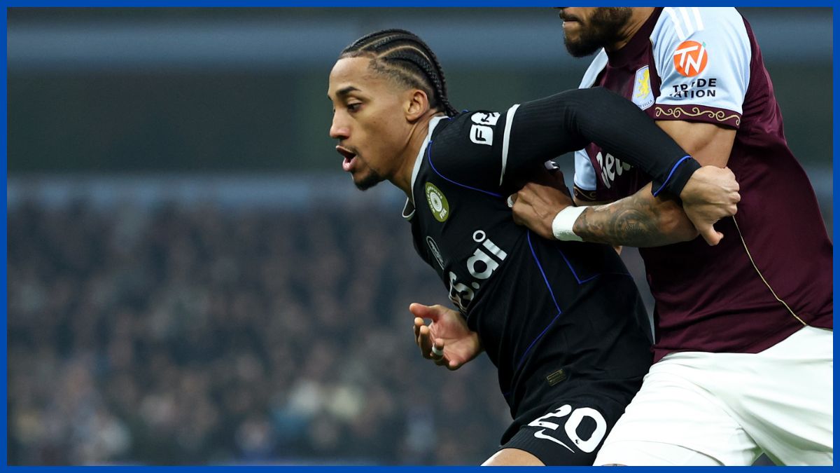 Joao Pedro battles with Tyrone Mings.