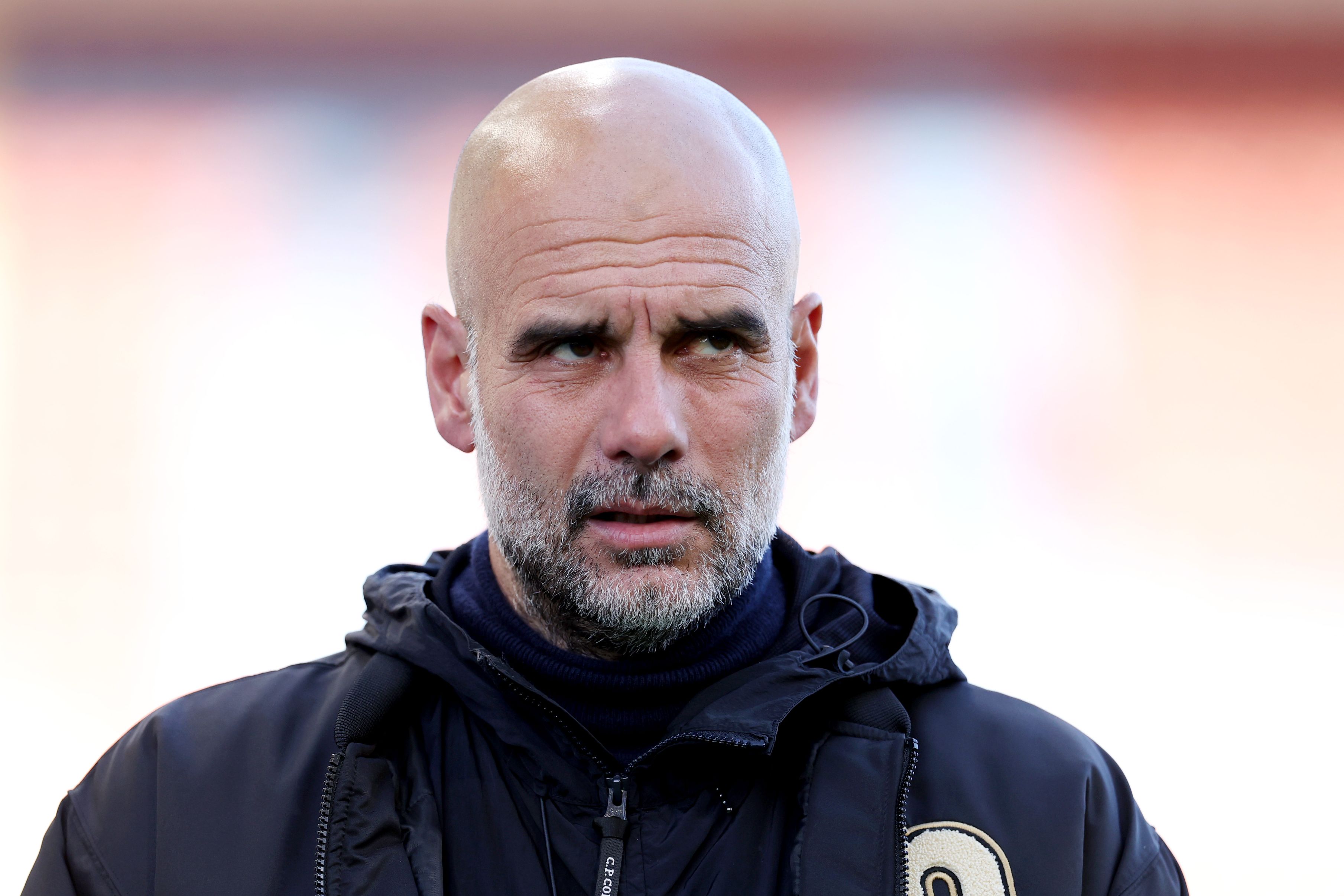 Pep Guardiola arrives at Manchester City game.