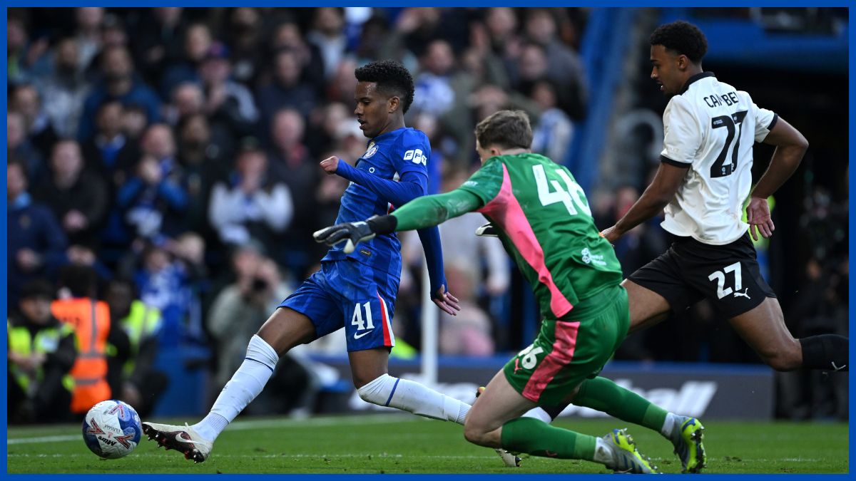 Estevao Willian slides in his goal.